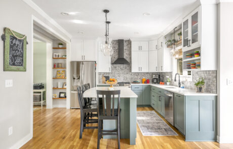 Central Ohio kitchen remodel featuring two toned custom kitchen cabinetry with white upper cabinets and blue green lower cabinets.