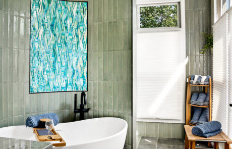 Dublin Ohio custom Bathroom Remodel Dublin Bathroom with curved privacy wall behind freestanding tub.