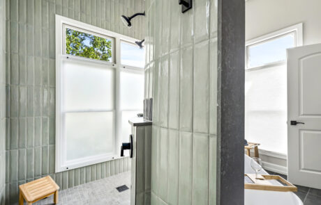 Dublin Bathroom Remodel 2 Dublin Bathroom shower with curved wall showing vertical tile details.